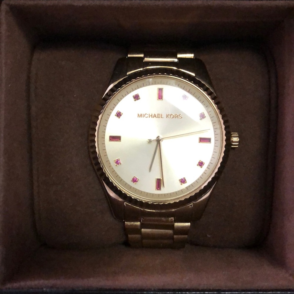 Gold band Michael Kors watch. Barely used. Like new